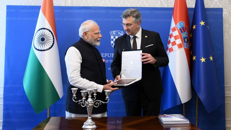 pm-modi-receives-special-gift-in-croatia-–-a-grammar-book-of…written-by…